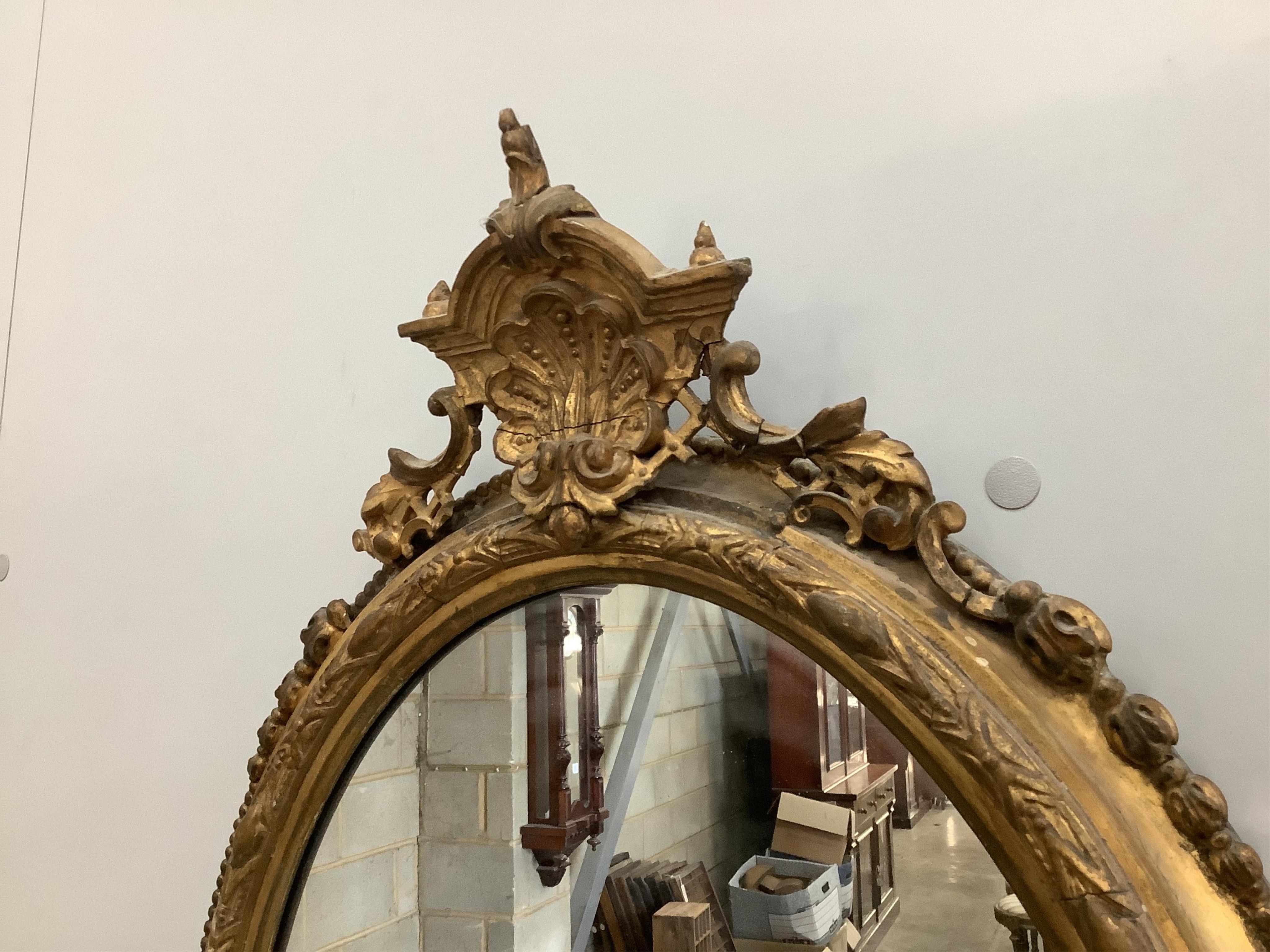 A Victorian giltwood and composition girandole wall mirror, width 43cm, height 73cm. Condition - poor to fair